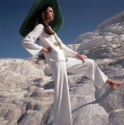 Fashion Model in Scenic Landscape Photograph