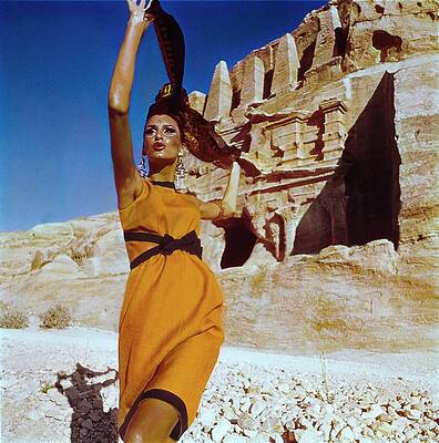 Orange Wall Art featuring the photograph Model Wearing Yves Saint Laurent by Henry Clarke