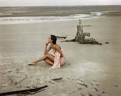 Contemplative Woman on a Sandy Beach Wall Art