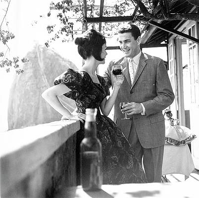 Stylish Couple Enjoying Wine on Balcony Wall Art