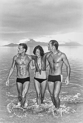 Three Models Stroll on the Beach Wall Art