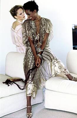 Elegant Women in Chic Attire Photograph