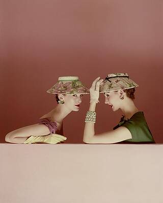 Elegant Models in Floral Hats Photograph