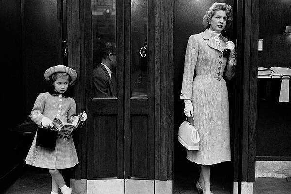 Vintage Mother and Daughter at Phone Booth Wall Art