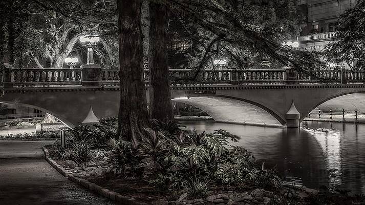 Serene Nighttime Bridge Reflection Photograph