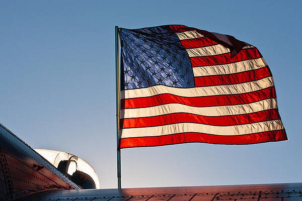 Wall Art featuring the photograph Old Glory Over The Liberator by Jeff Sinon