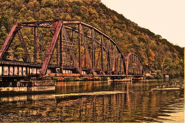 Sky Wall Art featuring the photograph Old Railroad Bridge With Sepia Tones by Jonny D