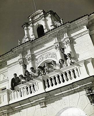Group Of People Photograph - People On A Balcony Of The Jaimanitas-biltmore by Toni Frissell