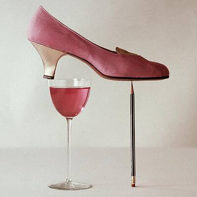 Balancing Act with Pink Shoe Photograph