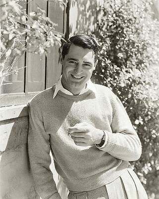 Smiling Man in a Sweater Photograph