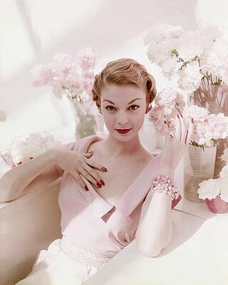 Elegant Woman in Pink with Flowers Photograph
