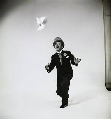 Wall Art featuring the photograph Portrait Of Man With Bird by Herbert Matter