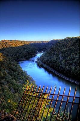 Sky Wall Art featuring the photograph River Through A Valley by Jonny D