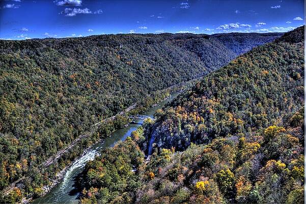 Green Wall Art featuring the photograph River Through The Hills by Jonny D