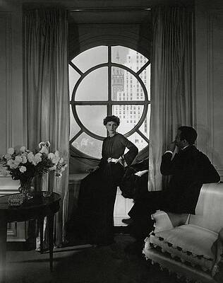 Elegant Couple by Circular Window Photograph