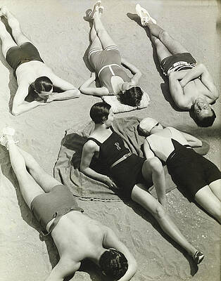 People Relaxing on Sunlit Beach Wall Art