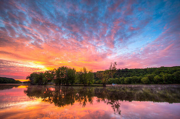Sunset Over a Tranquil Lake Photograph