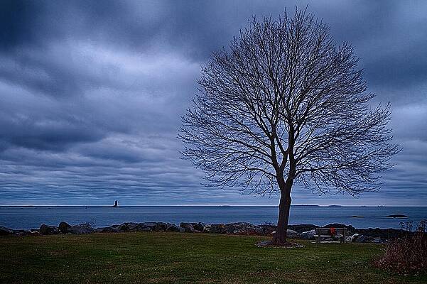 Wall Art featuring the photograph Stormy Skies Over Whaleback Light. by Jeff Sinon