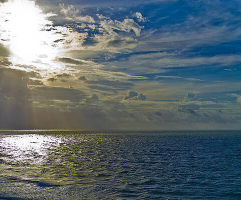 Water Photograph - Sun Through The Clouds by Jonny D