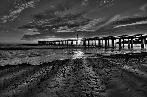 Sky Photograph - Sunrays Through The Pier In Black And White by Beth Sargent