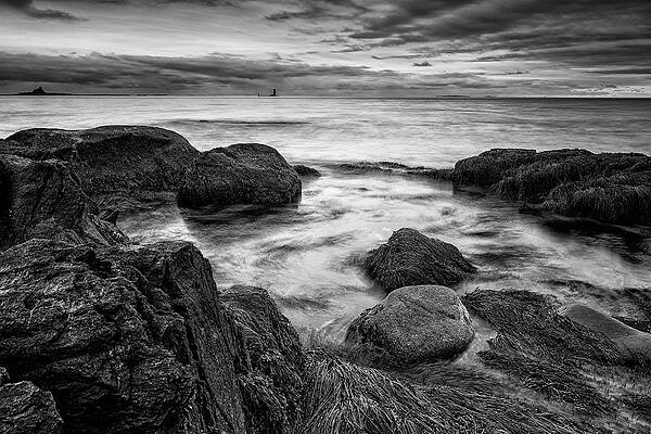 Cloud Wall Art featuring the photograph Surf Among The Boulders With Whaleback Light by Jeff Sinon