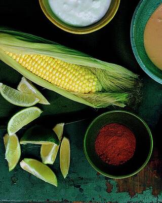 Gourmet Wall Art featuring the photograph Sweetcorn And Limes by Romulo Yanes