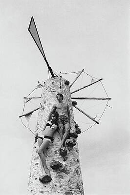 Greece Photograph - Swimwear Models Posing On A Windmill by Leonard Nones