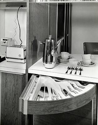 Swing Wall Art featuring the photograph Swing Out Draws In A Kitchen by Pedro E. Guerrero