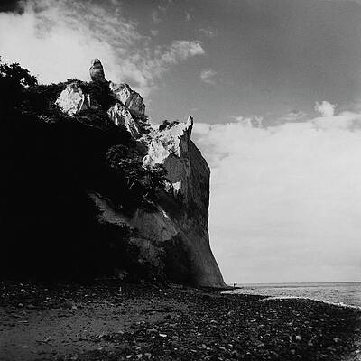 Dramatic Coastal Cliffs at Sunrise Photograph