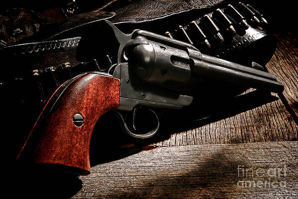 Vintage Revolver on Wooden Table Photograph