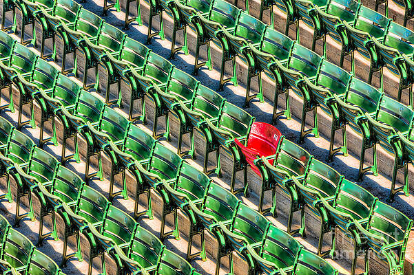 Red Chair in Sea of Green Seats Wall Art