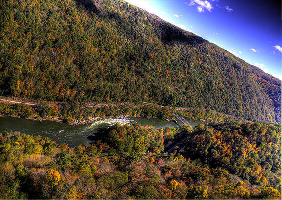 Green Wall Art featuring the photograph The River Below by Jonny D