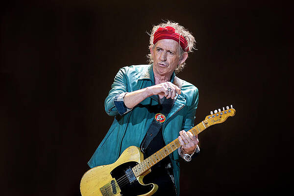 Wall Art featuring the photograph The Rolling Stones Perform At The 02 by Neil Lupin