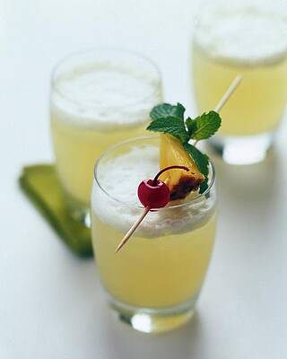 Wall Art featuring the photograph The Wahine Cocktail by Romulo Yanes