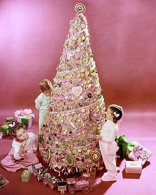 Wall Art featuring the photograph Three Children Eating A Candy Christmas Tree by Herbert Matter