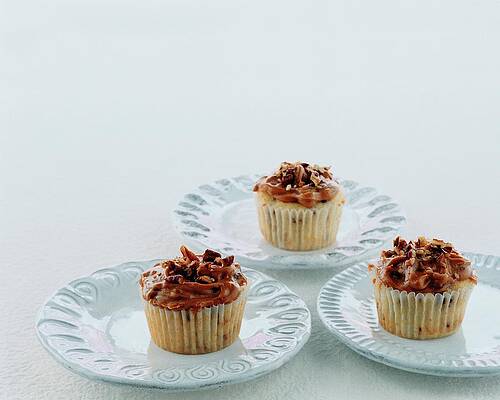 Baking Wall Art featuring the photograph Three Cranberry Cupcakes by Romulo Yanes