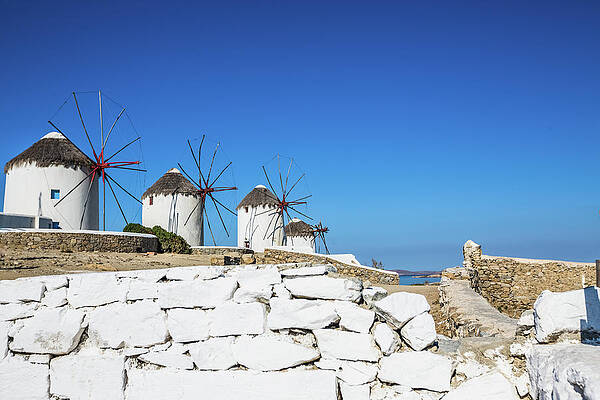 Wall Art featuring the photograph Traditional Windmills Of Mykonos by Deimagine