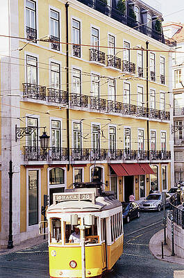 Yellow Tram in City Street Wall Art