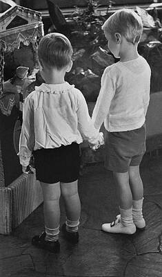 6 Wall Art featuring the photograph Two Young Boys Holding Hands by Remie Lohse