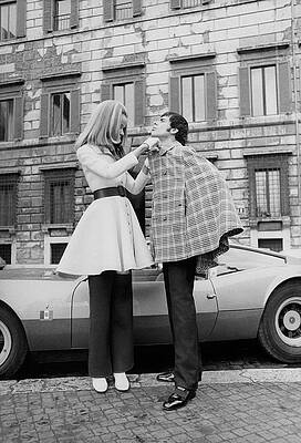 Stylish Couple in 1960s Fashion Photograph