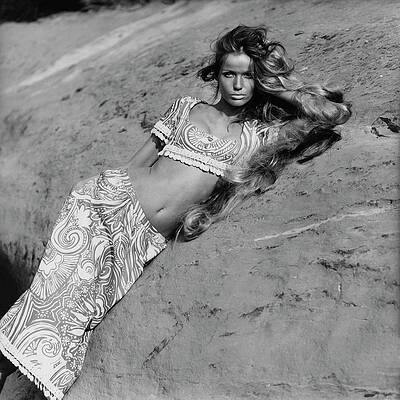 Model Posing on Sand Dune Photograph