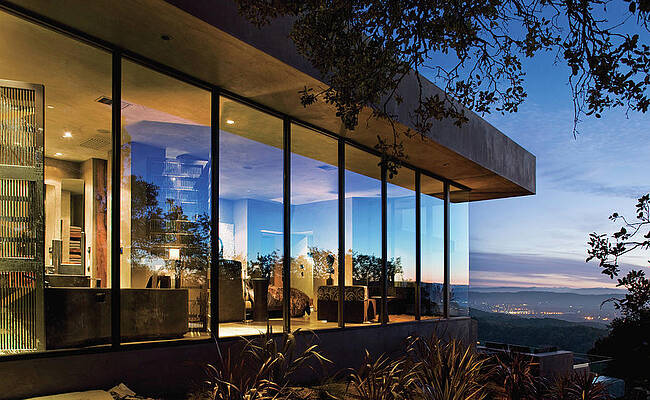 Modern Glass House at Sunset Photograph