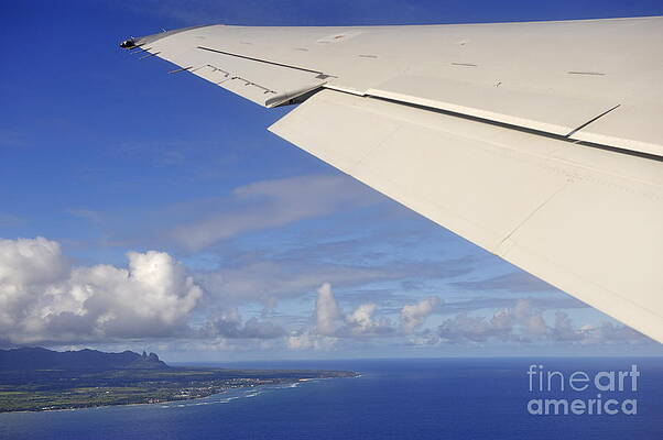 Transportation Wall Art featuring the photograph Wing Of Airplane Leaving by Sami Sarkis Photography