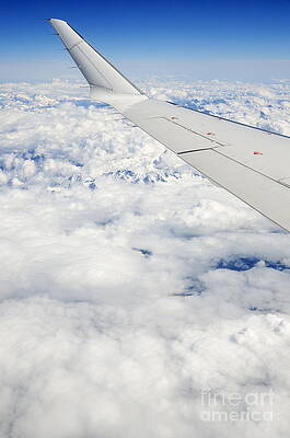 Transportation Wall Art featuring the photograph Wing Of Flying Airplane Over French Alps by Sami Sarkis Photography