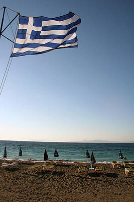 Water Wall Art featuring the photograph Greek Flag Over Sandy Beaches #1 by La Dolce Vita