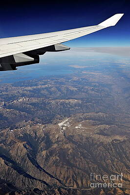 Transportation Wall Art featuring the photograph Wing Of Flying Airplane Over Wyoming Mountains #1 by Sami Sarkis Photography