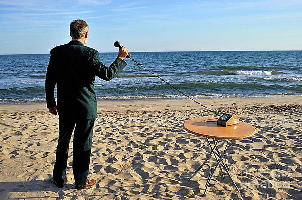 Beach Wall Art featuring the photograph Businessman On Beach With Landline Phone Receiver by Sami Sarkis Photography