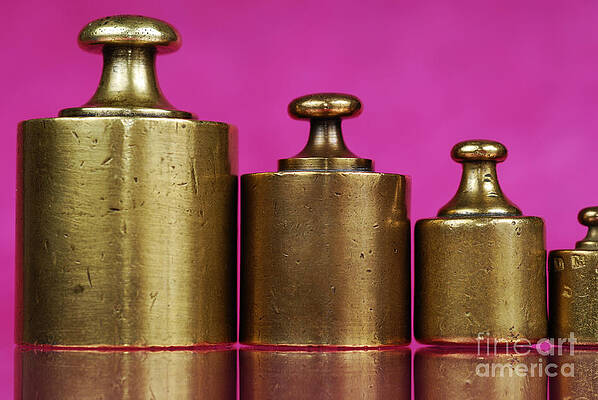 Close Up Photograph - Copper Weights On Pink Background by Sami Sarkis Photography