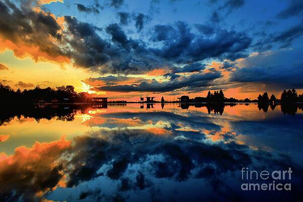 Sunset Reflections Over Calm Lake Wall Art