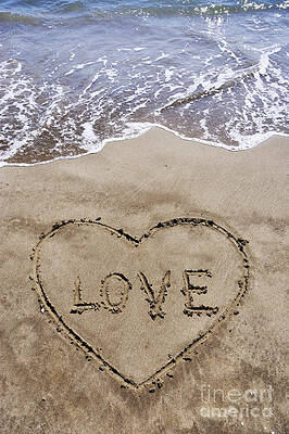 Beach Wall Art featuring the photograph Heartshape Drawn In Sand On Beach With Love Word Inside by Sami Sarkis Photography